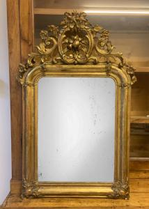 Antique gilded mirror with crest